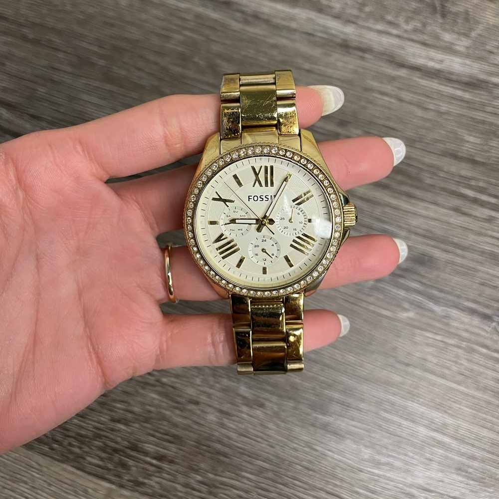 Gold fossil watch